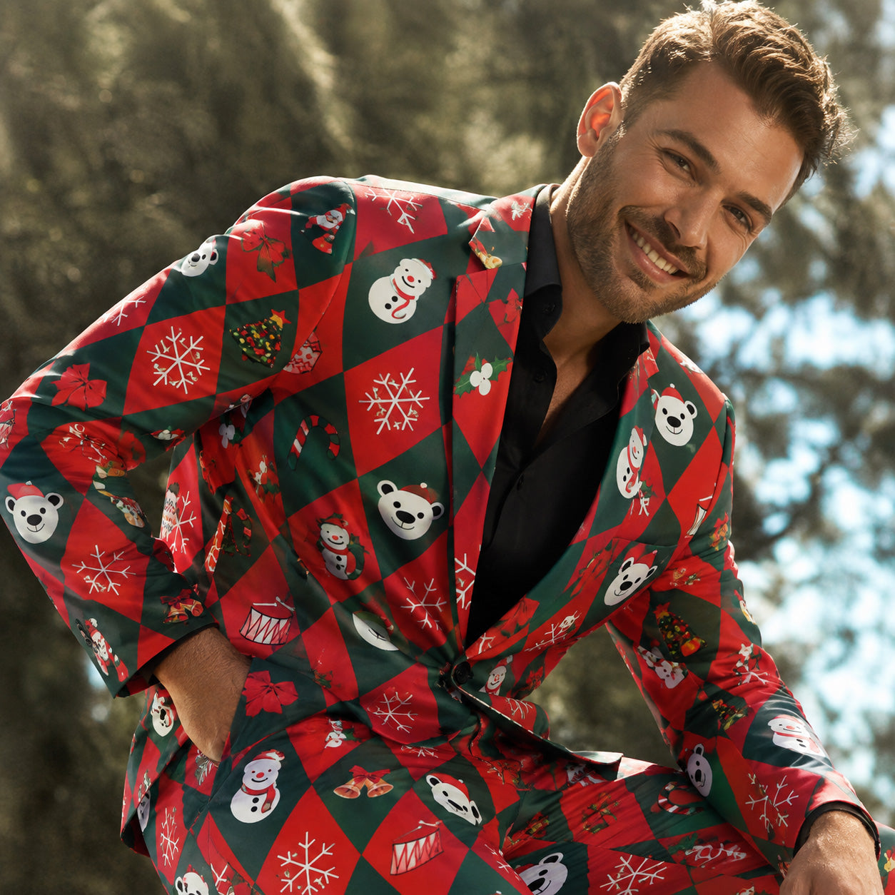 Close-up of men's Christmas blazer featuring festive printed designs including snowflakes, bells, and Santa.
