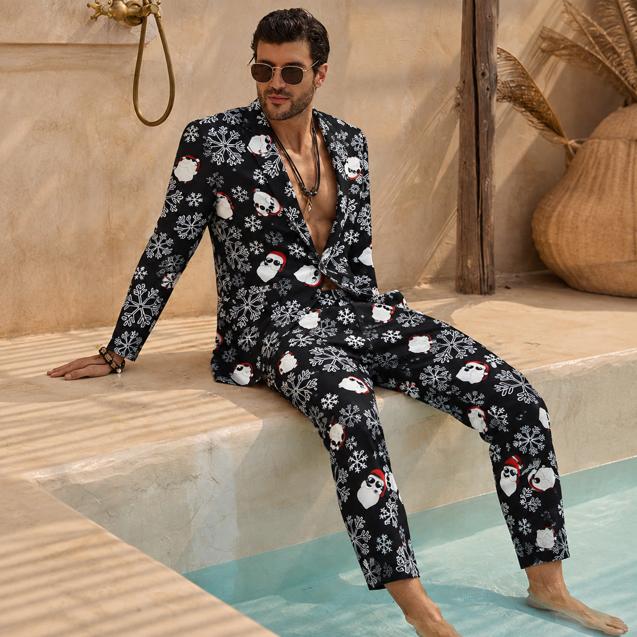 Men's stylish printed holiday party blazer and pants worn in a relaxed setting | WISHOLIC