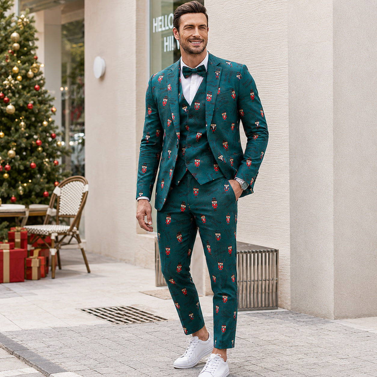 Full-body view of a man wearing a green Christmas nutcracker print suit and white sneakers by WISHOLIC