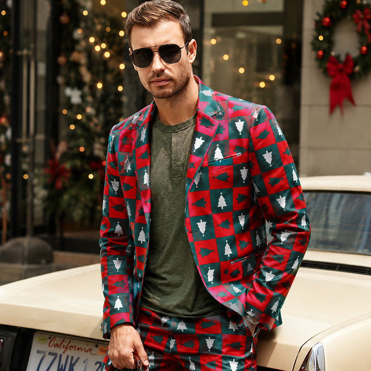 WISHOLIC men's holiday Christmas tree suit jacket and trousers leaning against a vintage car