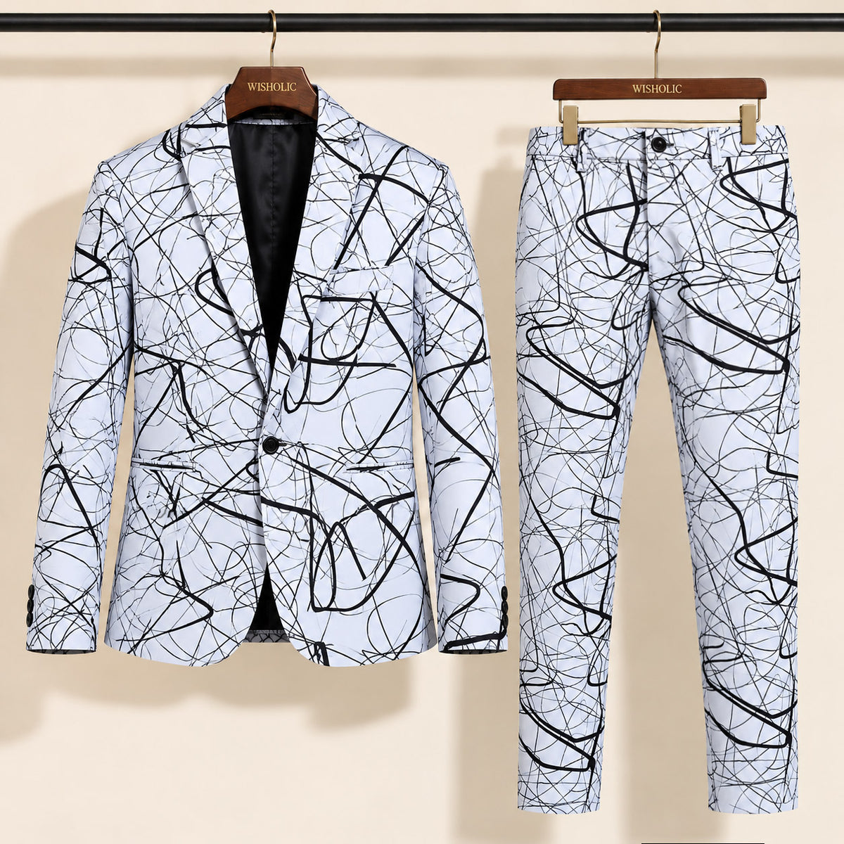 Wisholic monochrome abstract line print blazer and matching tailored trousers displayed on wooden hangers[cite: 41]