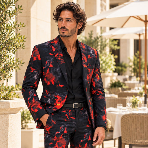 WISHOLIC men's crimson red and black flame print statement suit styled with a black shirt at a luxury outdoor terrace