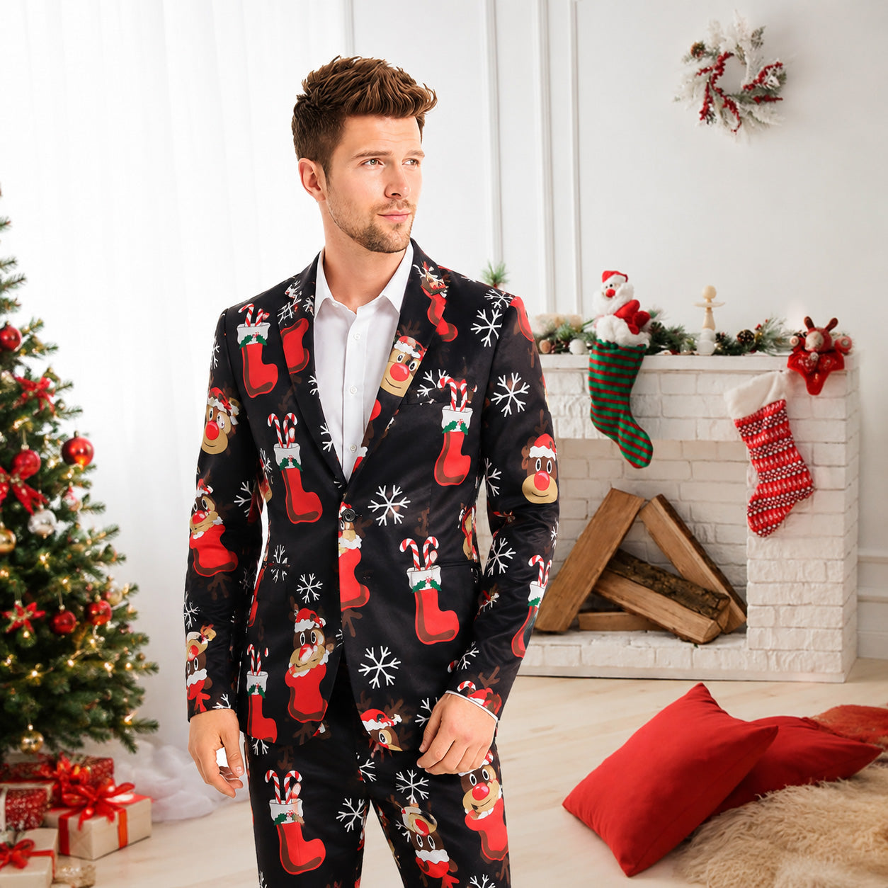 Wisholic men's black ugly Christmas suit featuring printed reindeer, stockings, and snowflakes in a cozy festive living room