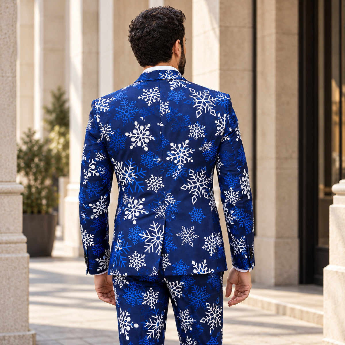 Back view of WISHOLIC men's navy blue snowflake Christmas suit showing the printed blazer and matching trousers.