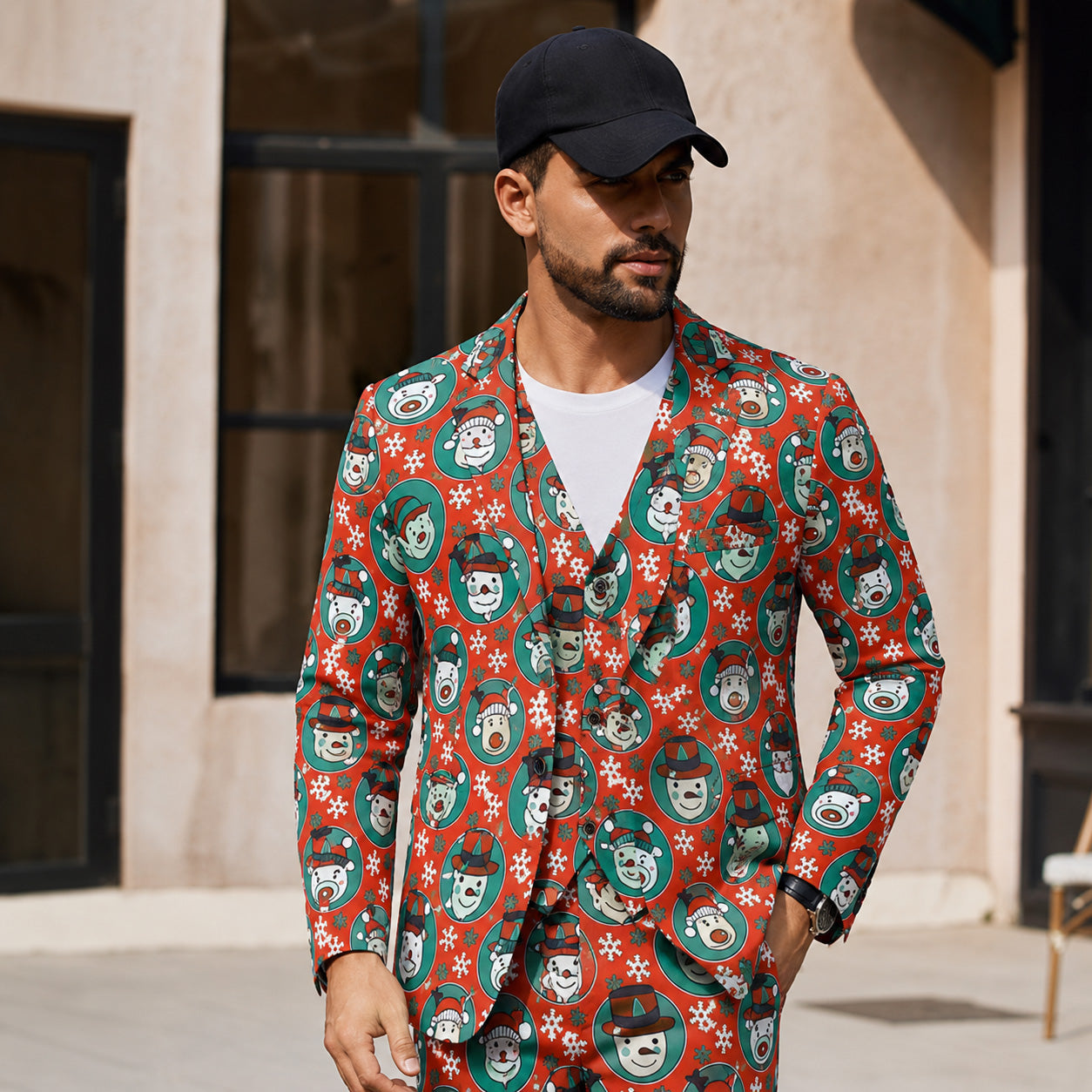 Man wearing a WISHOLIC red Christmas print suit jacket and vest with sunglasses, holding a phone in front of a Christmas tree background.