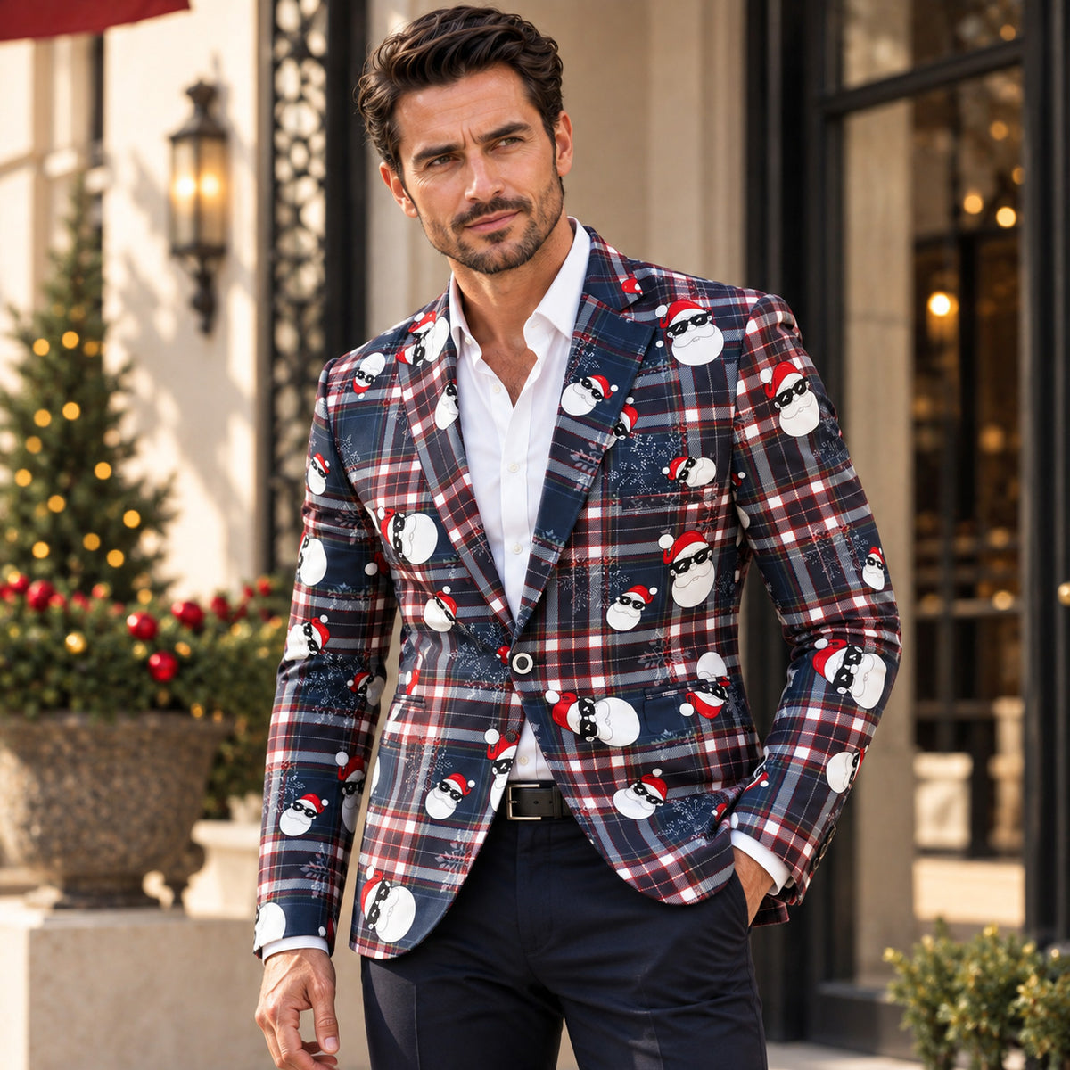 Handsome model posing with hands in pockets wearing Wisholic festive navy red plaid suit with cool Santa graphics.