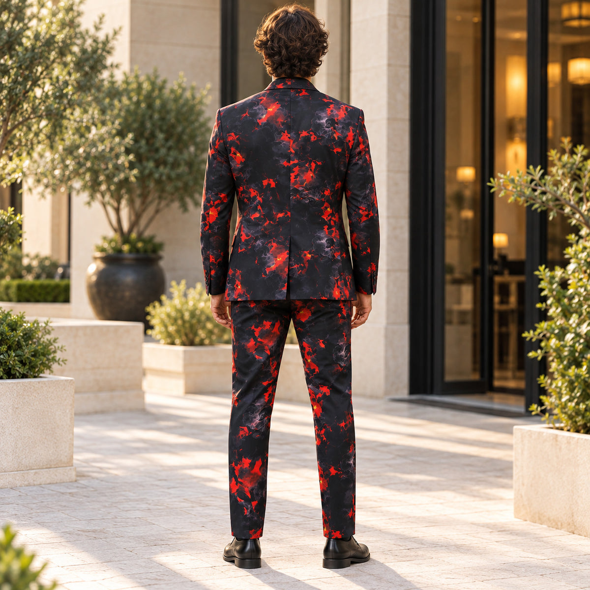 Back view of Wisholic tailored suit jacket and pants showing slim fit silhouette in red smoke print