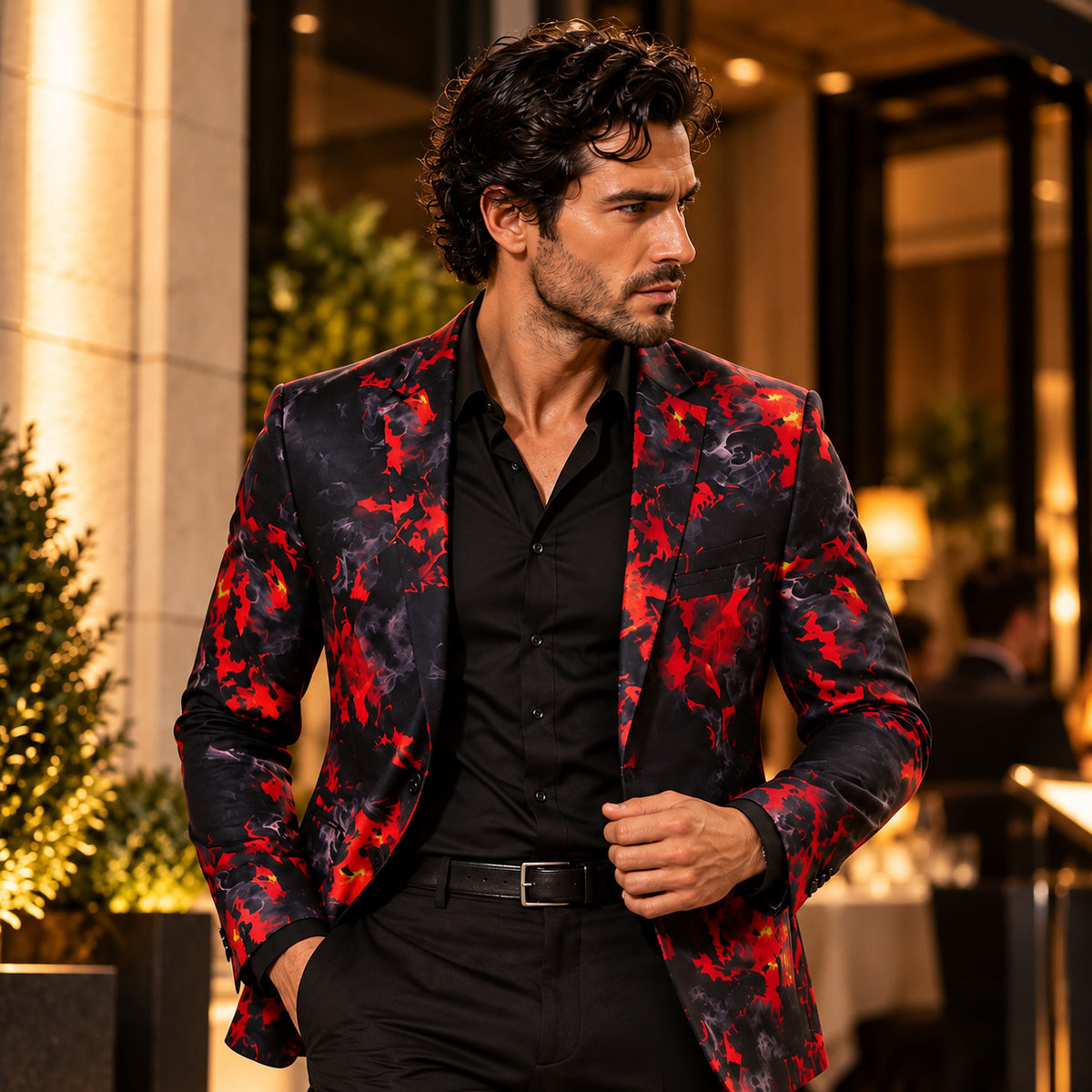Wisholic men's red flame printed blazer styled with a black dress shirt and black trousers.