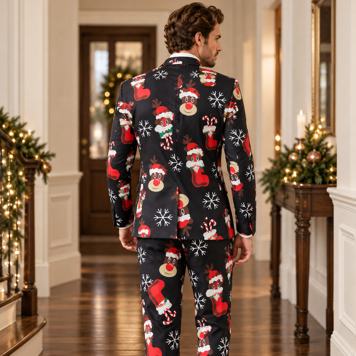Back view of WISHOLIC men's black reindeer Christmas suit showing the printed blazer, matching trousers and festive snowflake pattern.