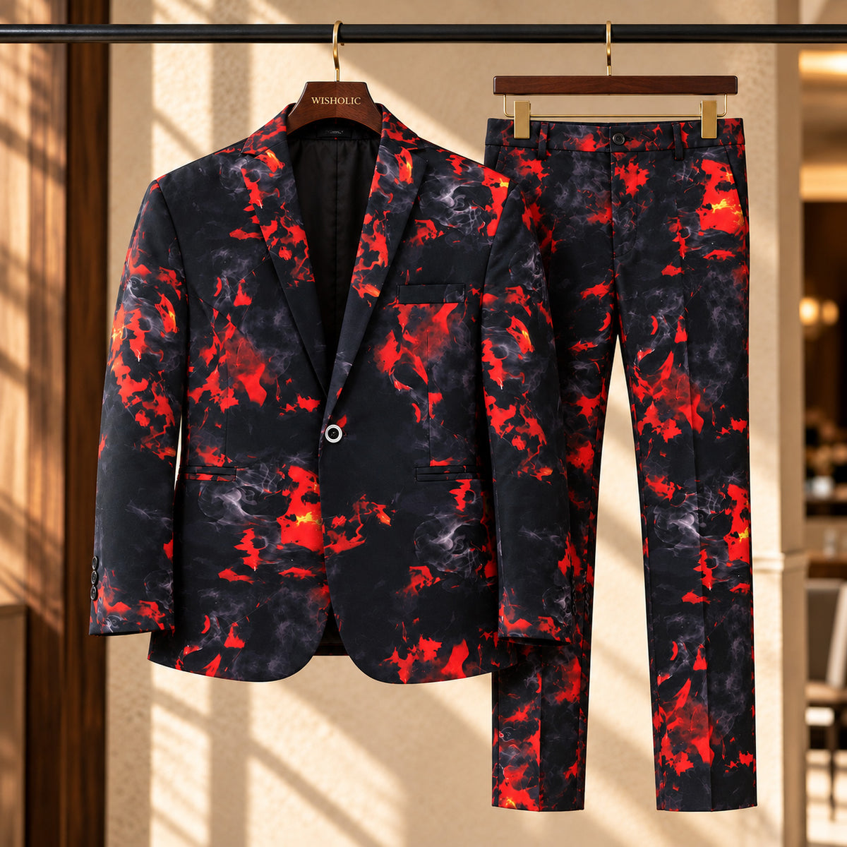 Wisholic men's red and black abstract flame print blazer and matching trousers hanging on a wooden coat hanger.
