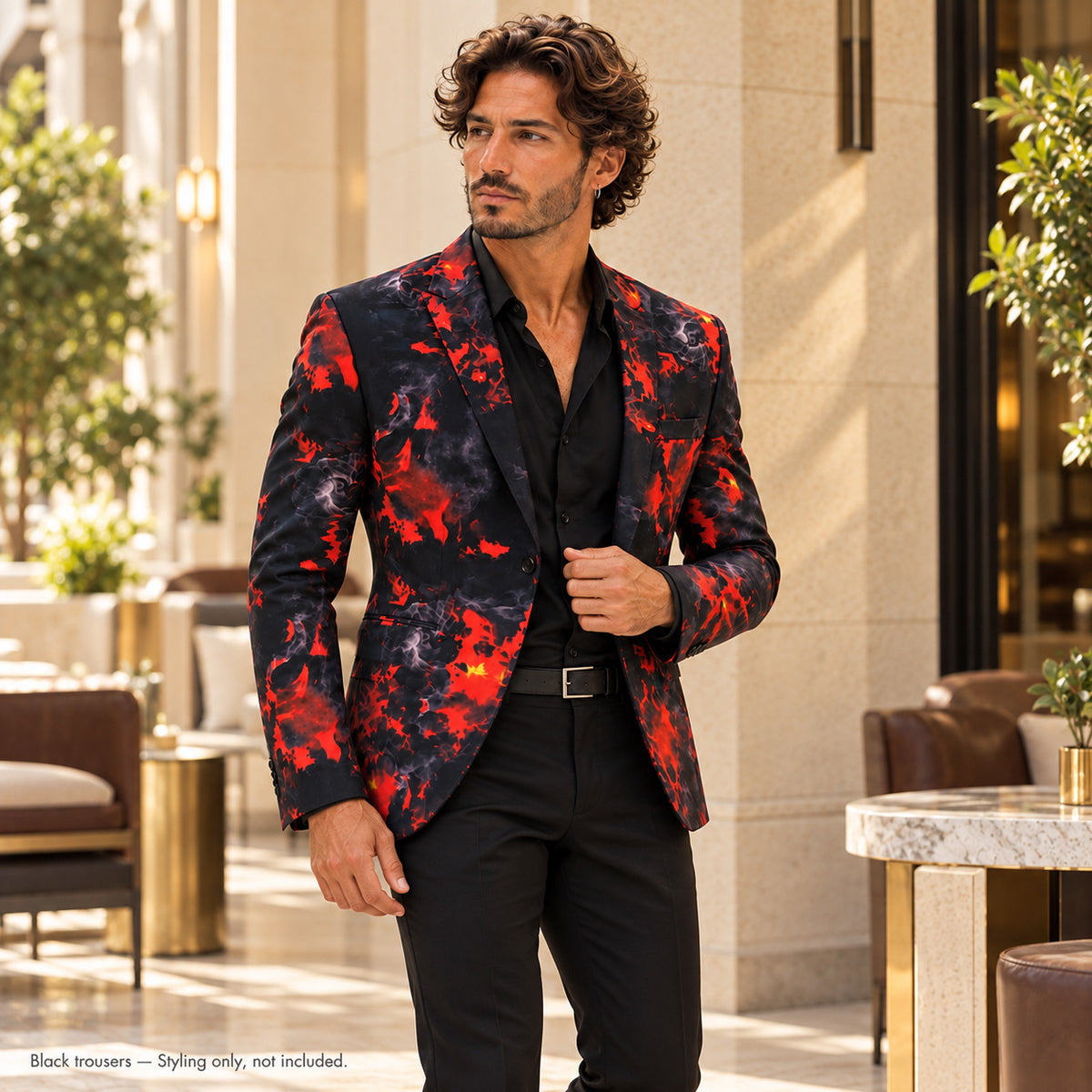 WISHOLIC red and black flame print statement blazer styled with a black shirt and black trousers for a refined occasion look