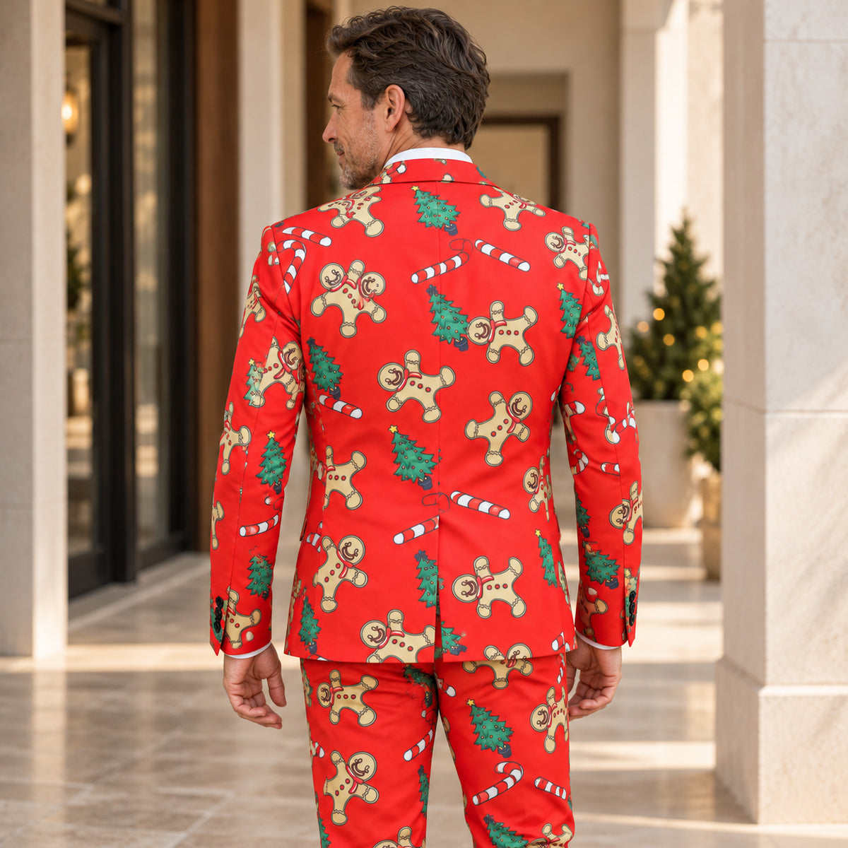 Back view of WISHOLIC men's red gingerbread Christmas suit showing the festive print, tailored blazer and matching trousers.