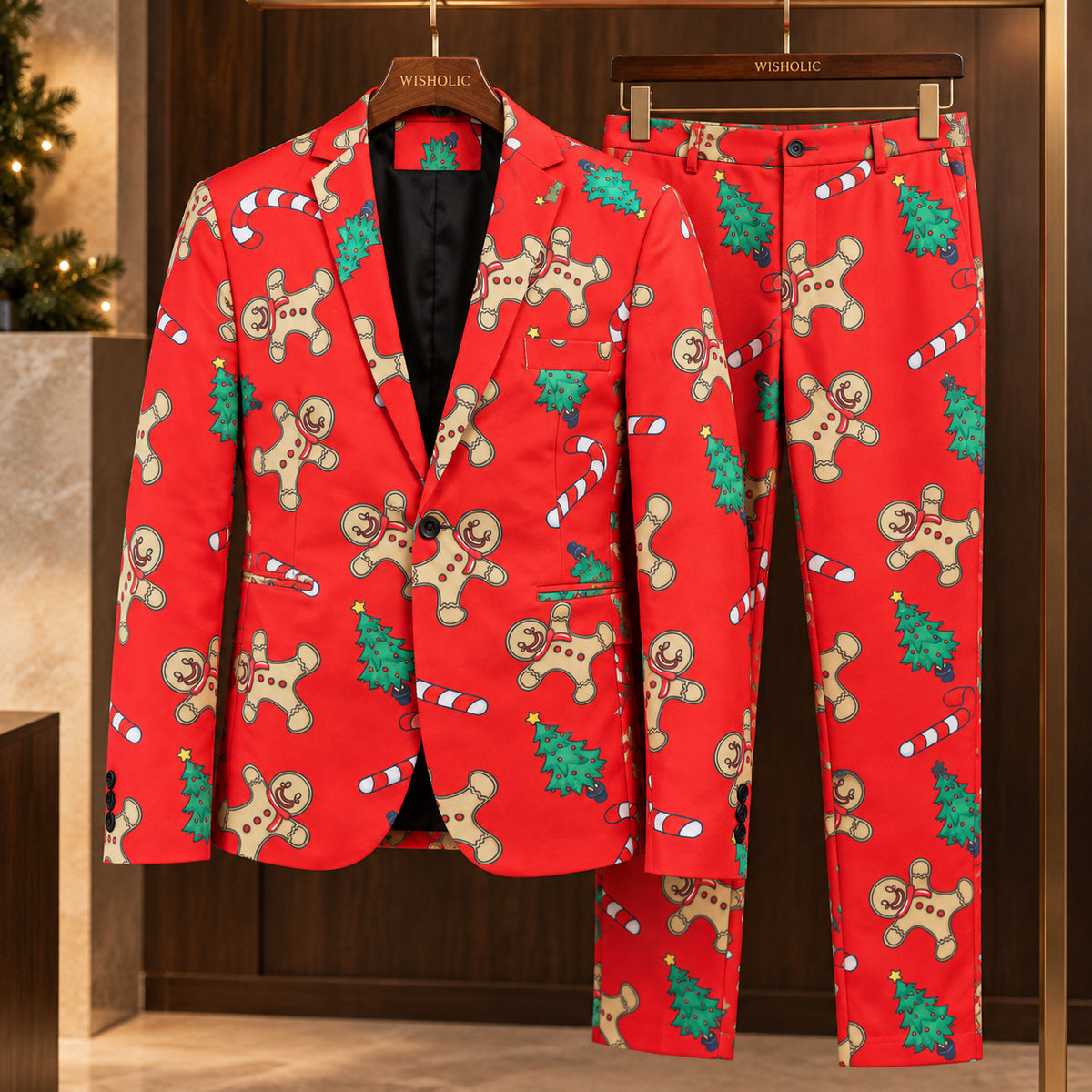 WISHOLIC red gingerbread Christmas two-piece suit featuring a single-button blazer and matching printed trousers on wooden hangers.