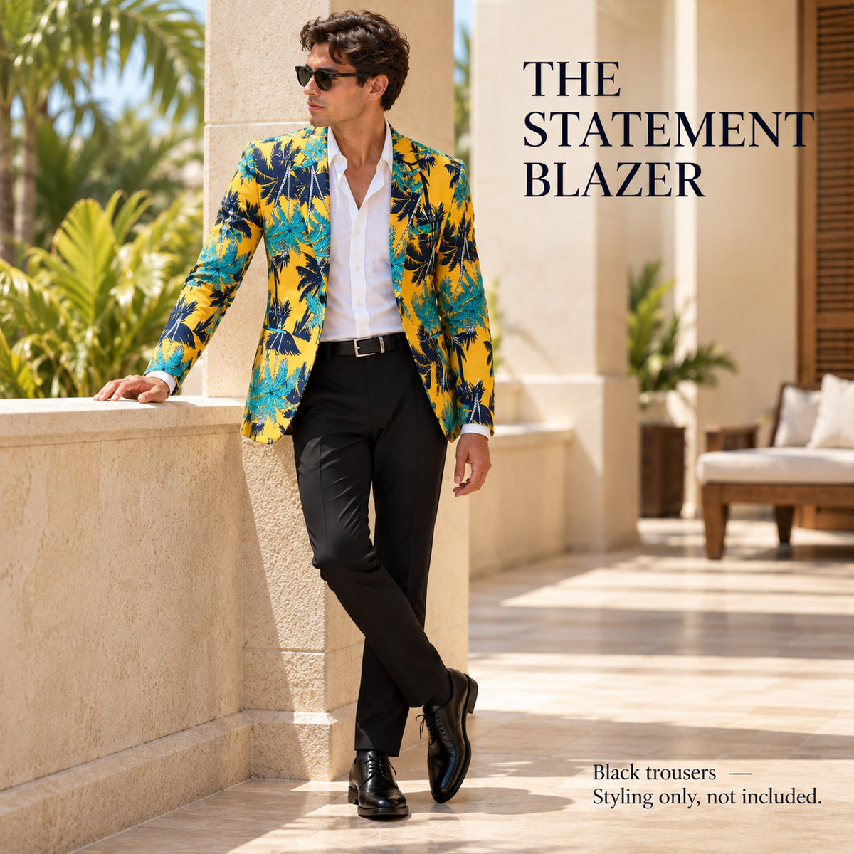 WISHOLIC yellow and blue tropical palm print blazer styled with black trousers and a white shirt for an elegant resort look.