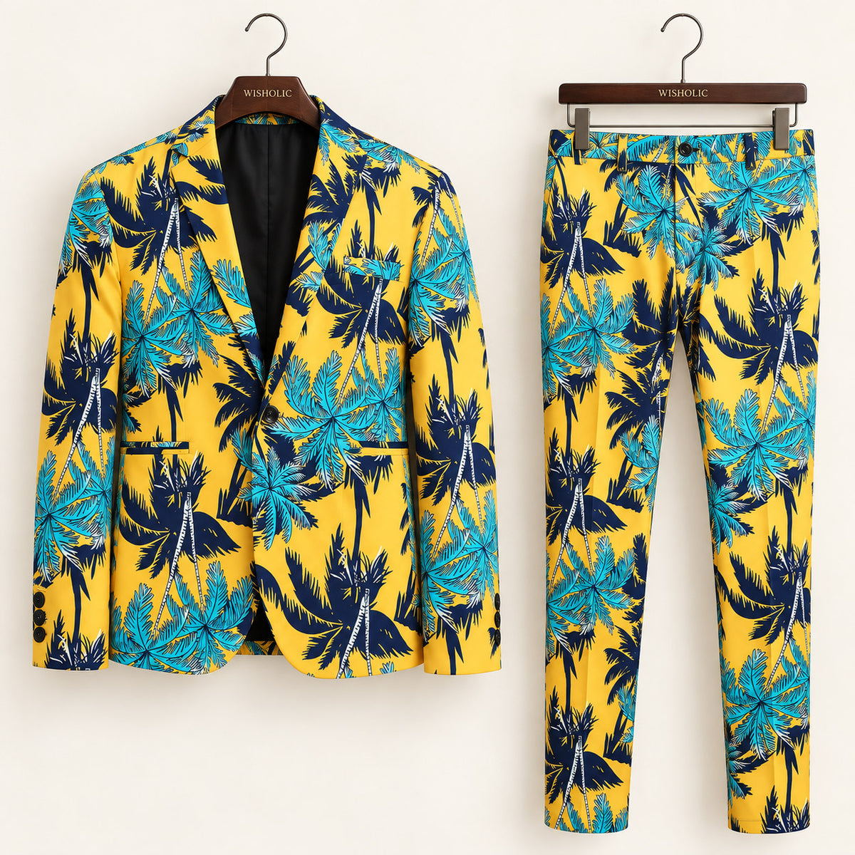 WISHOLIC tropical palm print two-piece men's suit featuring a yellow palm tree blazer and matching printed trousers on wooden hangers.