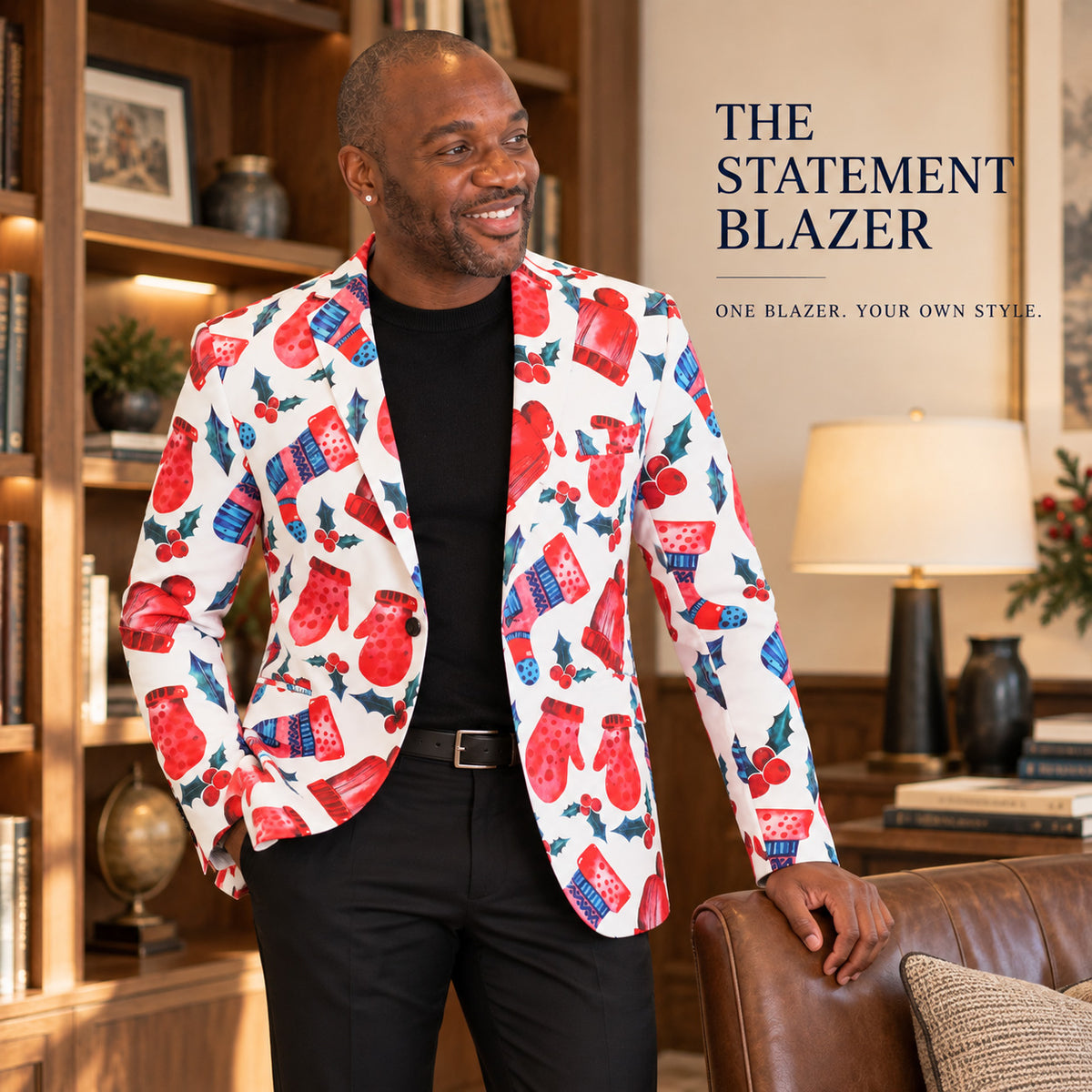 WISHOLIC white Christmas blazer featuring red mittens and festive winter prints, styled with a black knit sweater and black trousers.